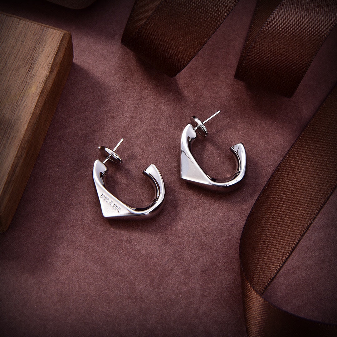 Prada Triangle Open 18K Gold Earrings product image 7, provided for visual reference and product detail review