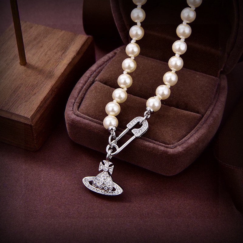 Vivienne West Mini Bas Relief Pearls 18K Gold Necklace product image 5, provided for visual reference and product detail