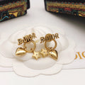 Dior J'Adior Star 18K Gold Earrings product image 1, provided for visual reference and product detail review