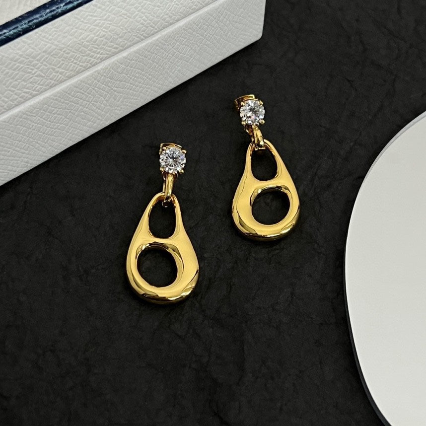 Prada Inverted Triangle 18K Gold Earrings product image 5, provided for visual reference and product detail review