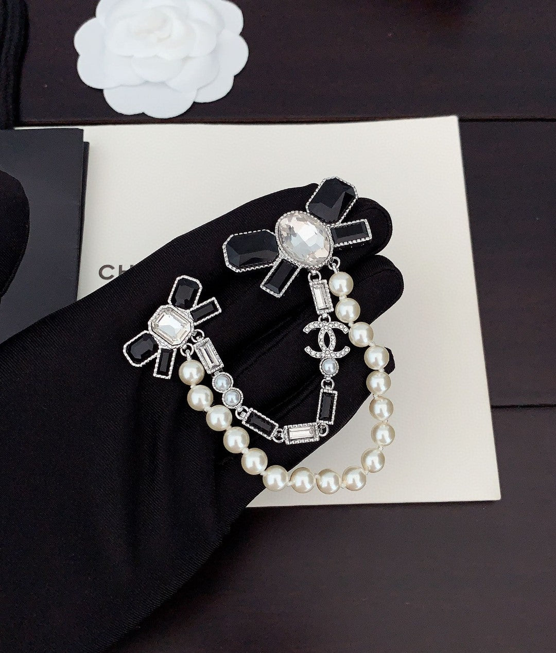Chanel Black Bow Pearls 18K Gold Brooch product image 3, provided for visual reference and product detail review