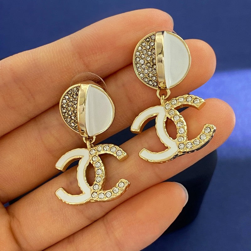 Chanel Half Diamond 18K Gold Earrings product image 4, provided for visual reference and product detail review