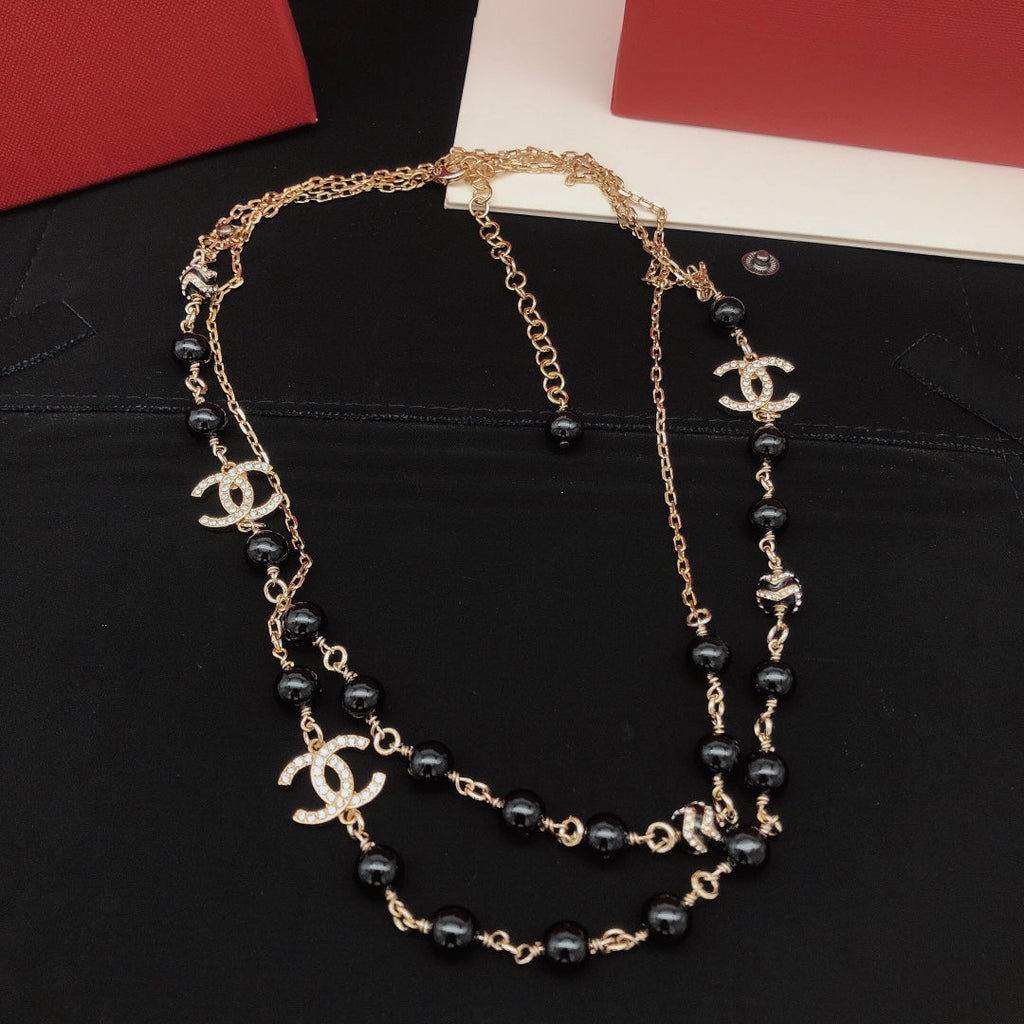Chanel Black Pearls 18K Gold Necklace product image 1, provided for visual reference and product detail review