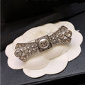 Chanel Bow Tie Diamond 18K Gold Brooch product image 1, provided for visual reference and product detail review