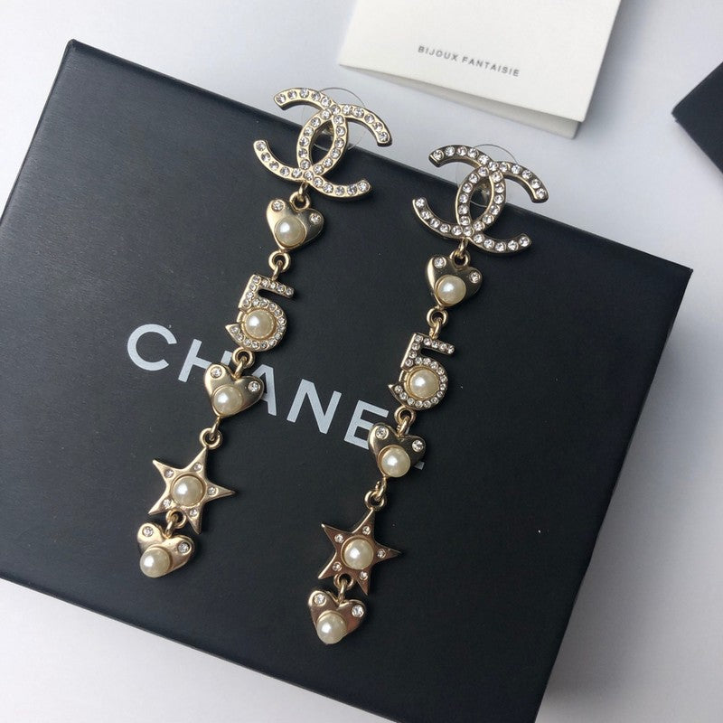 Chanel No.5 Long 18K Gold Earrings product image 4, provided for visual reference and product detail review