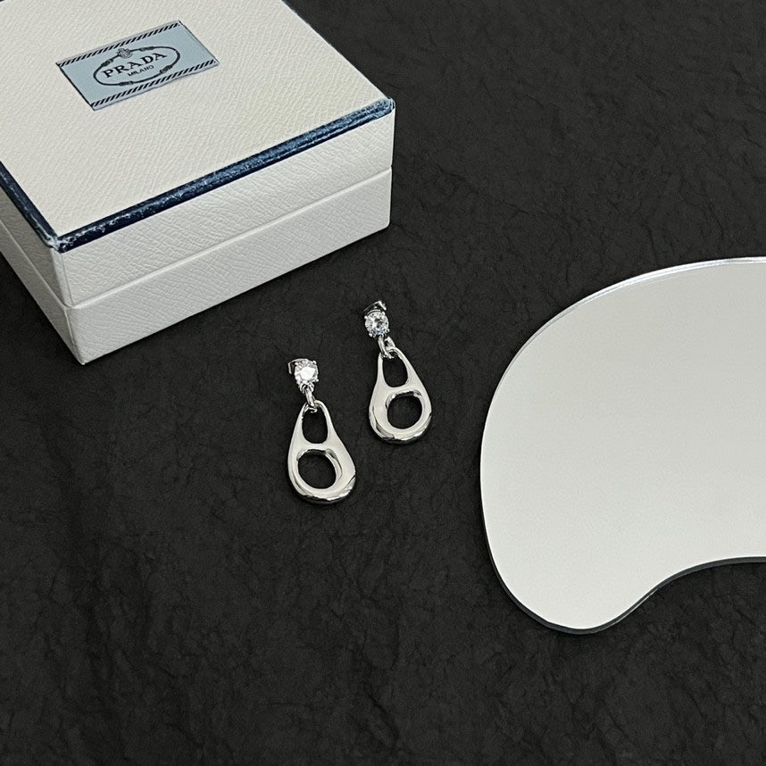 Prada Inverted Triangle 18K Gold Earrings product image 9, provided for visual reference and product detail review