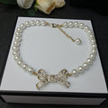 Chanel Bow Pearl 18K Gold Necklace product image 1, provided for visual reference and product detail review