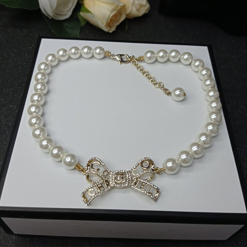 Chanel Bow Pearl 18K Gold Necklace product image 1, provided for visual reference and product detail review