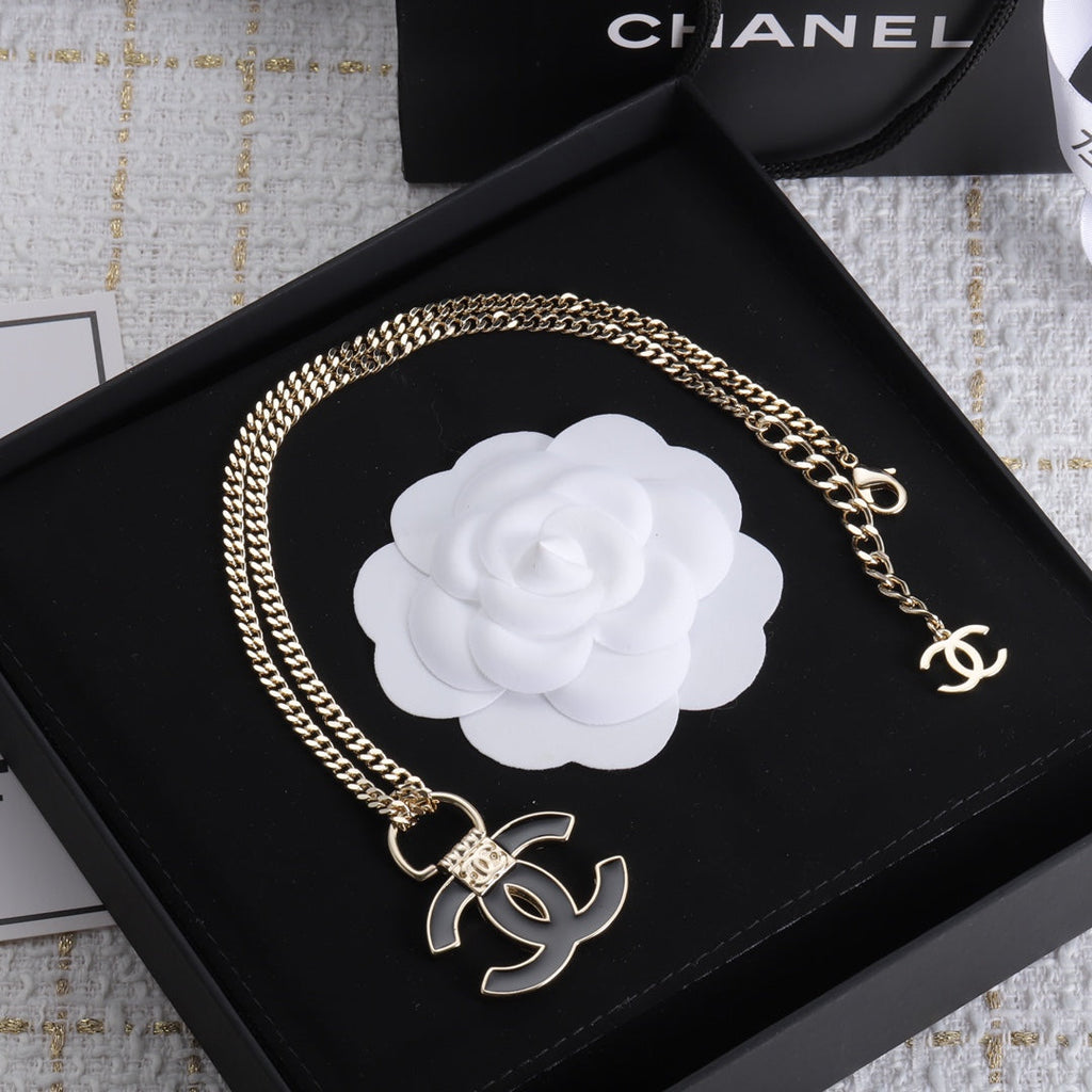 Chanel Black Resin Logo 18K Gold Necklace product image 5, provided for visual reference and product detail review