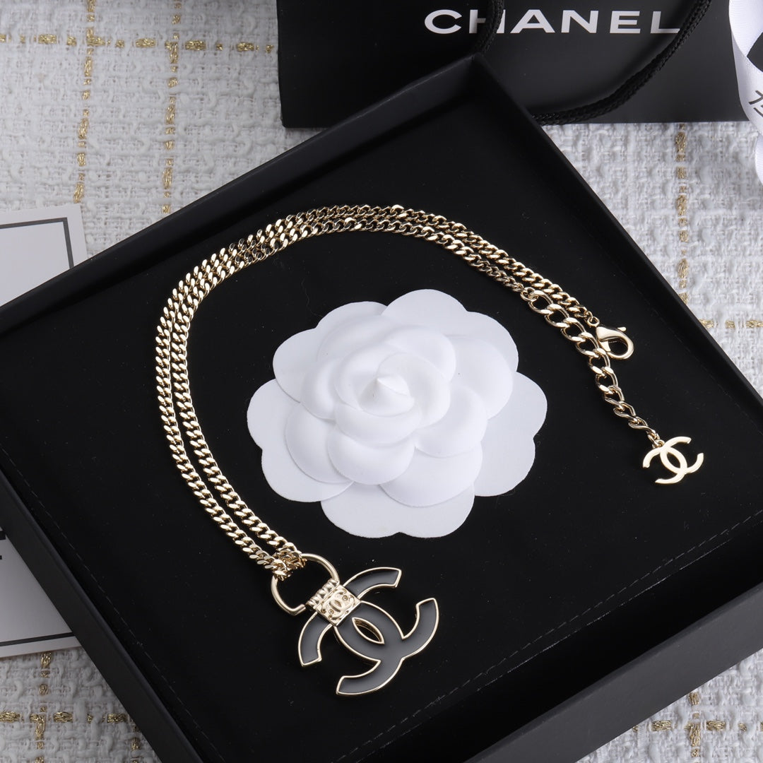 Chanel Black Resin Logo 18K Gold Necklace product image 5, provided for visual reference and product detail review