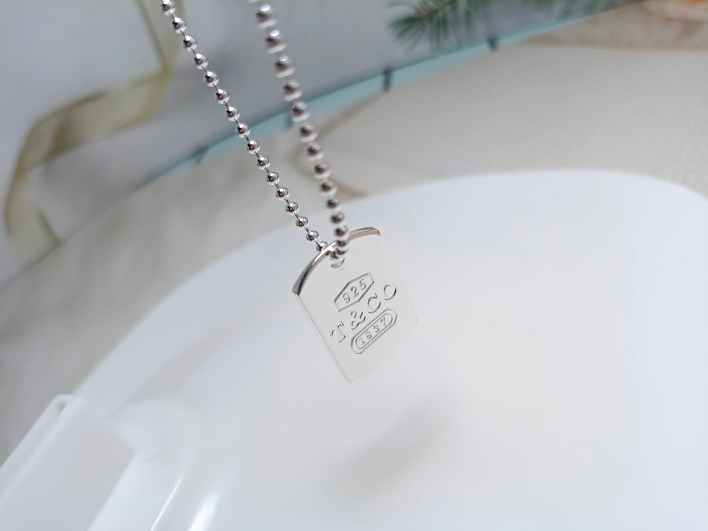Tiffany 1837 Tag Pendant 18K Gold Necklace product image 7, provided for visual reference and product detail review