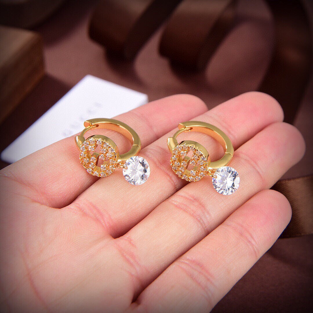 Gucci Double Interlocking Gucci Diamond 18K Gold Earrings product image 5, provided for visual reference and product detail