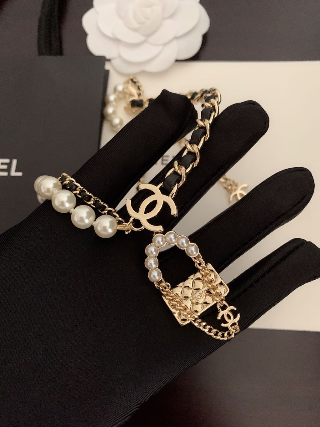 Chanel Pearl Leather Bag Pendant 18K Gold Necklace product image 5, provided for visual reference and product detail review
