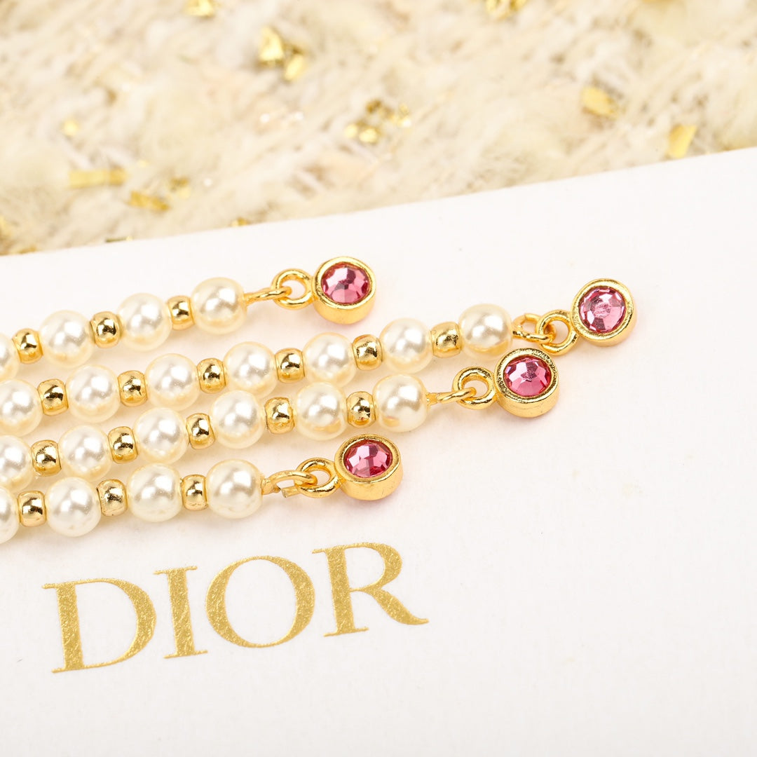 Dior Petit Tassel 18K Gold Earrings product image 3, provided for visual reference and product detail review