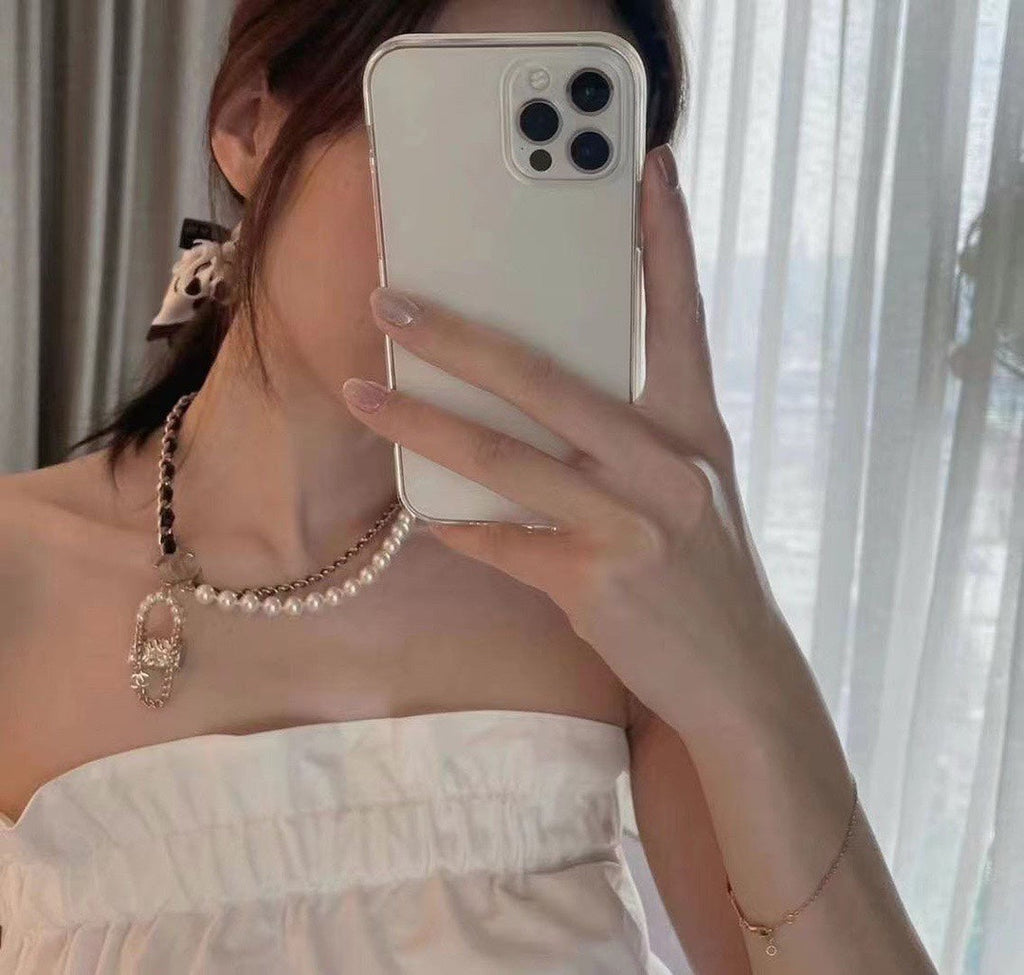 Chanel Pearl Bag Pendant 18K Gold Necklace product image 7, provided for visual reference and product detail review