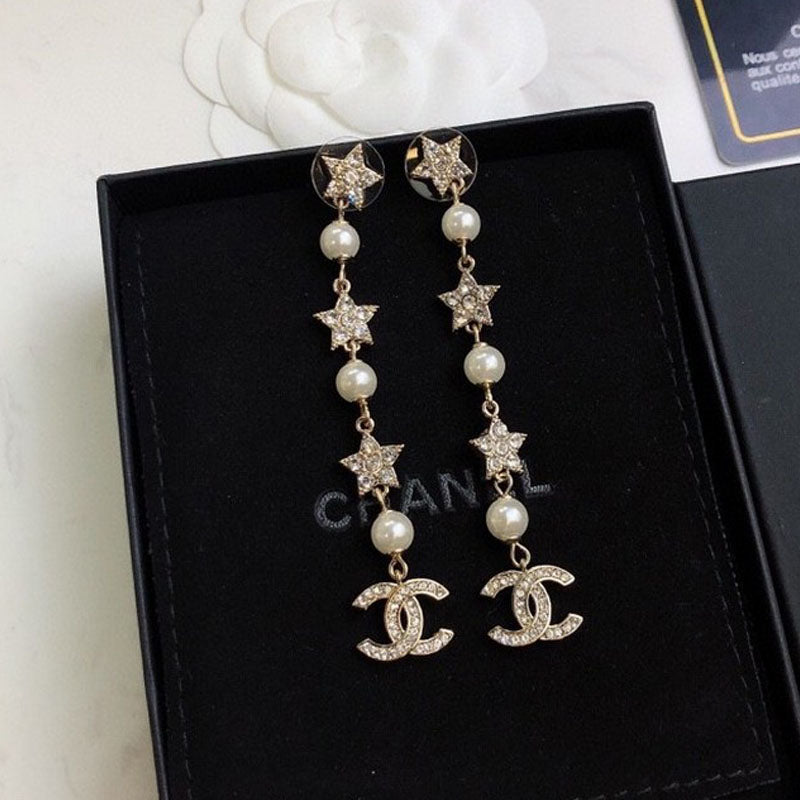Chanel Long Tassel 18K Gold Earrings product image 1, provided for visual reference and product detail review
