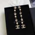 Chanel Long Tassel 18K Gold Earrings product image 1, provided for visual reference and product detail review