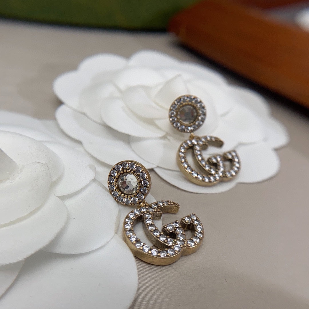 Gucci Double Crystal Pendant 18K Gold Earrings product image 7, provided for visual reference and product detail review