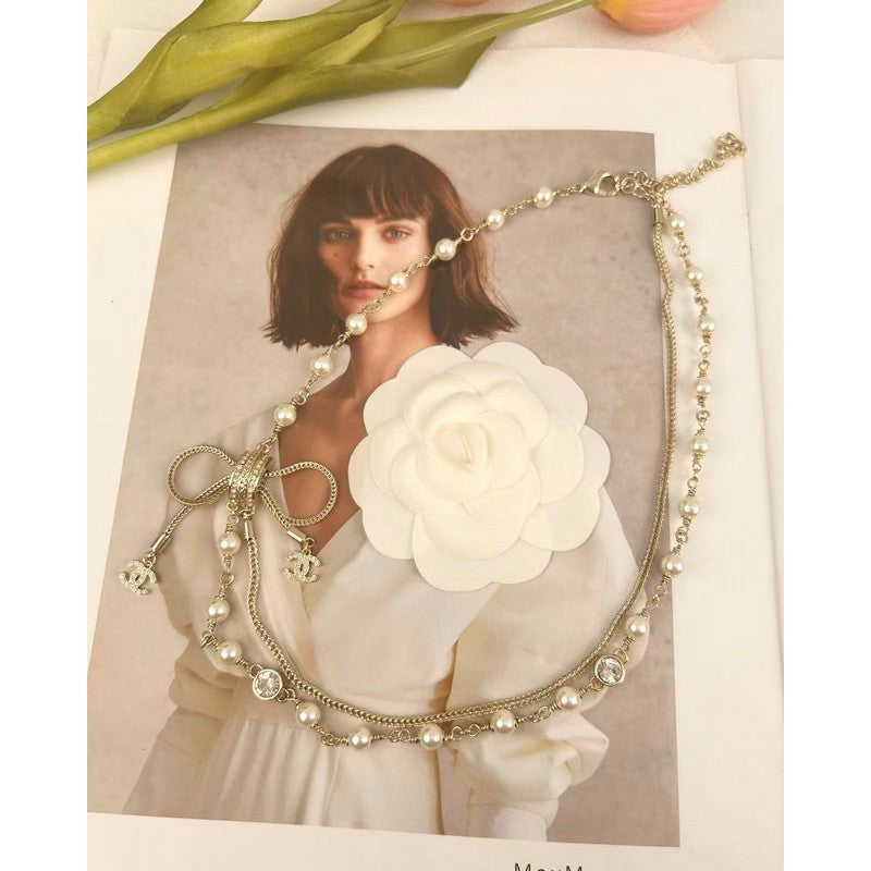 Chanel Bow Tie Pearl 18K Gold Necklace product image 5, provided for visual reference and product detail review