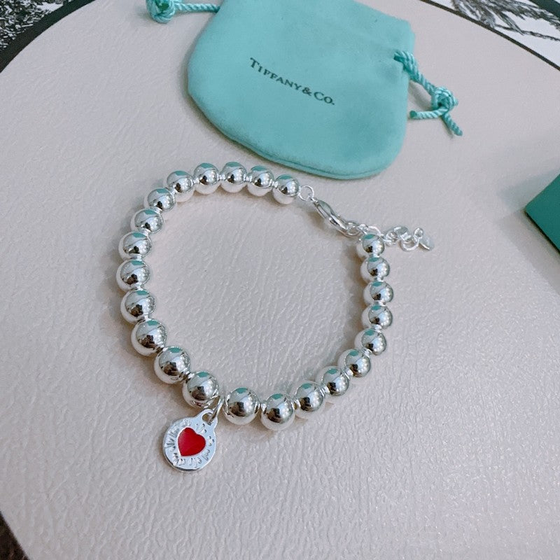 Tiffany Return to Red Heart Bead 18K Gold Bracelet product image 4, provided for visual reference and product detail review
