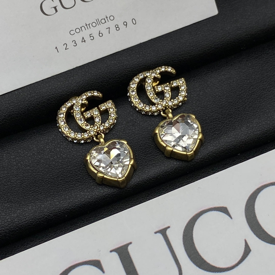 Gucci Double Crystal Pendant 18K Gold Earrings product image 2, provided for visual reference and product detail review