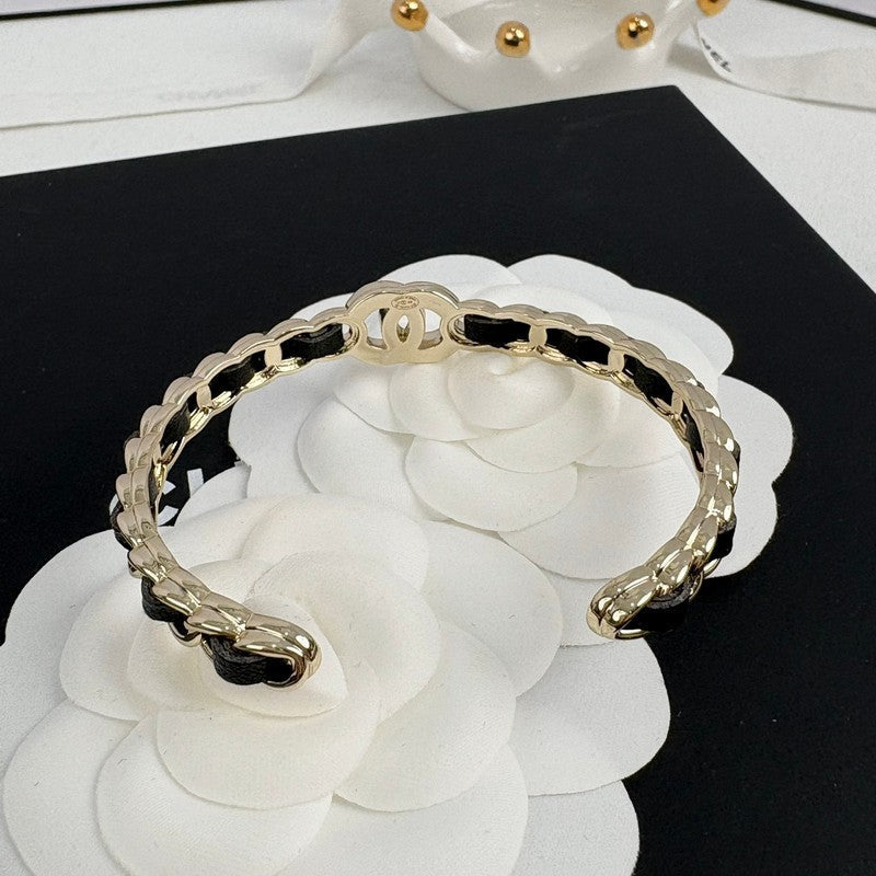 Chanel Black Leather Cuff 18K Gold Bracelet product image 4, provided for visual reference and product detail review