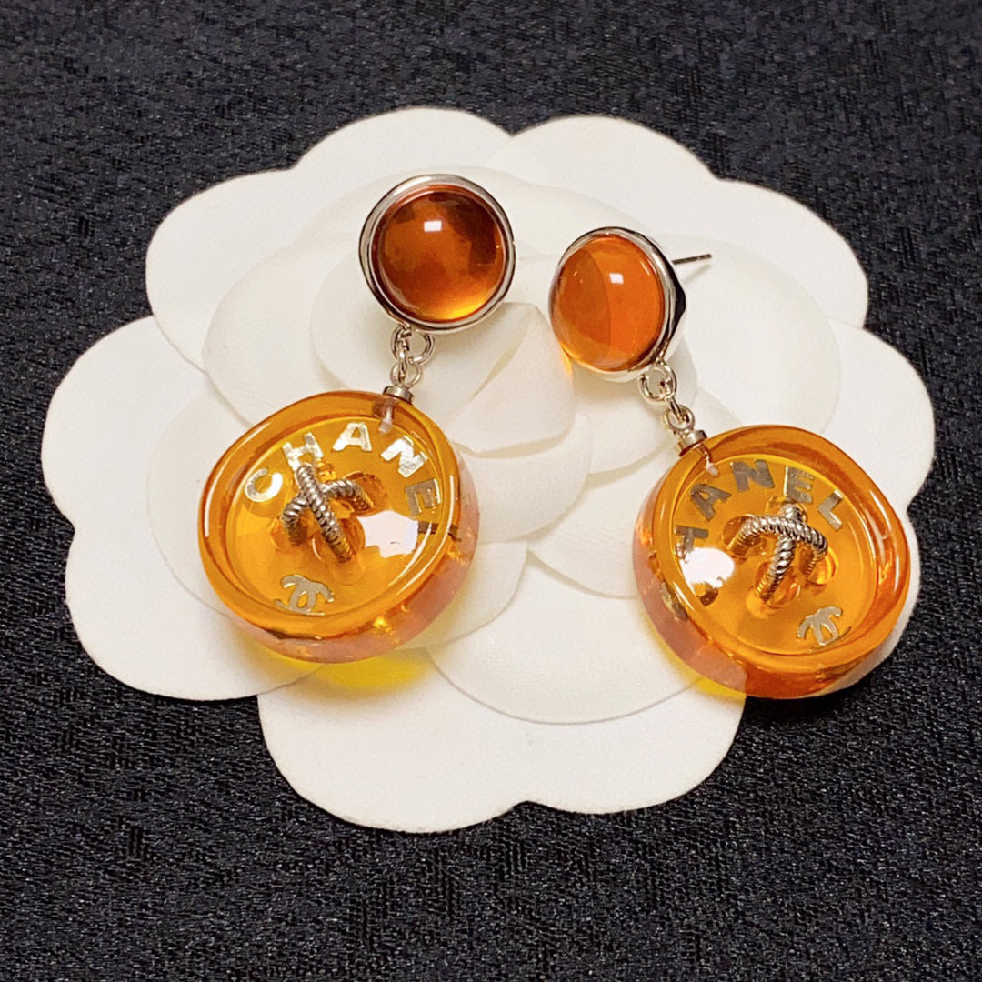 Chanel Orange Pendant 18K Gold Earrings product image 1, provided for visual reference and product detail review