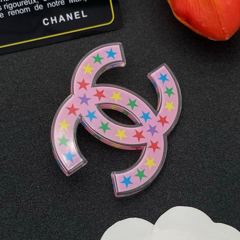 Chanel Pink & Black Star 18K Gold Brooch product image 4, provided for visual reference and product detail review