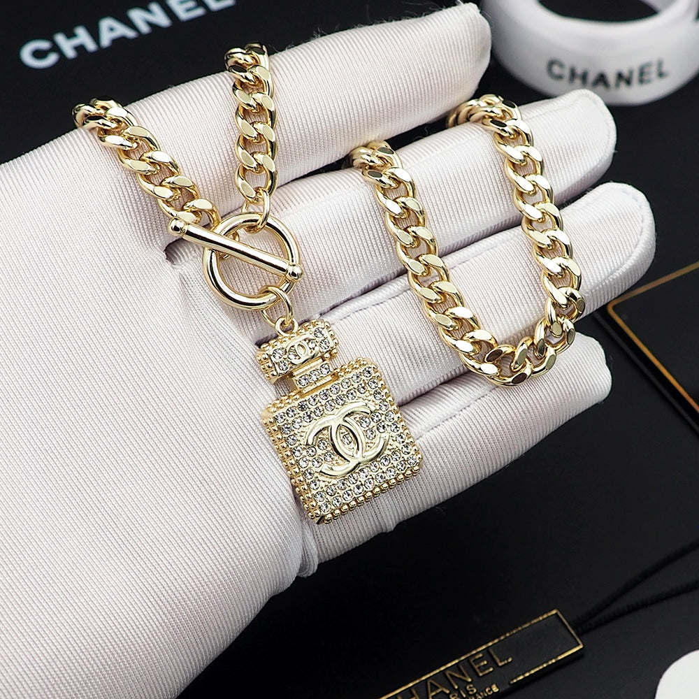 Chanel Diamond Perfume Bottle Pendant 18K Gold Necklace product image 3, provided for visual reference and product detail