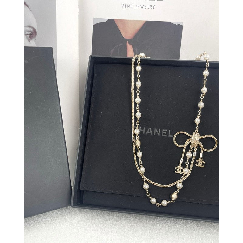 Chanel Bow Tie Pearl 18K Gold Necklace product image 6, provided for visual reference and product detail review