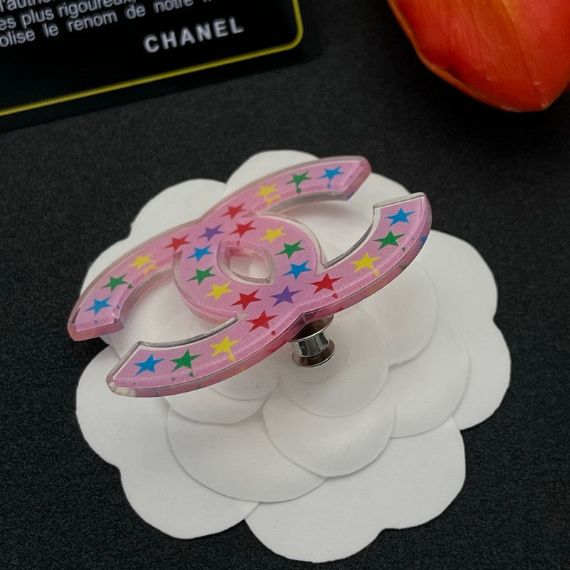 Chanel Pink & Black Star 18K Gold Brooch product image 5, provided for visual reference and product detail review