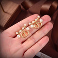 Dior Tribales Pearls 18K Gold Earrings product image 1, provided for visual reference and product detail review