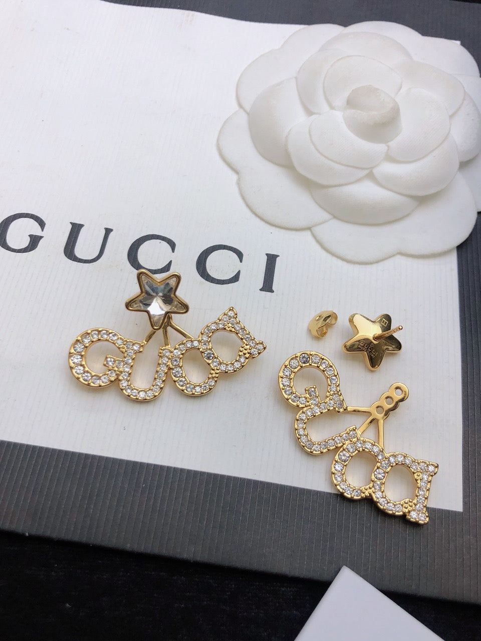 Gucci Double Script Star 18K Gold Earrings product image 9, provided for visual reference and product detail review