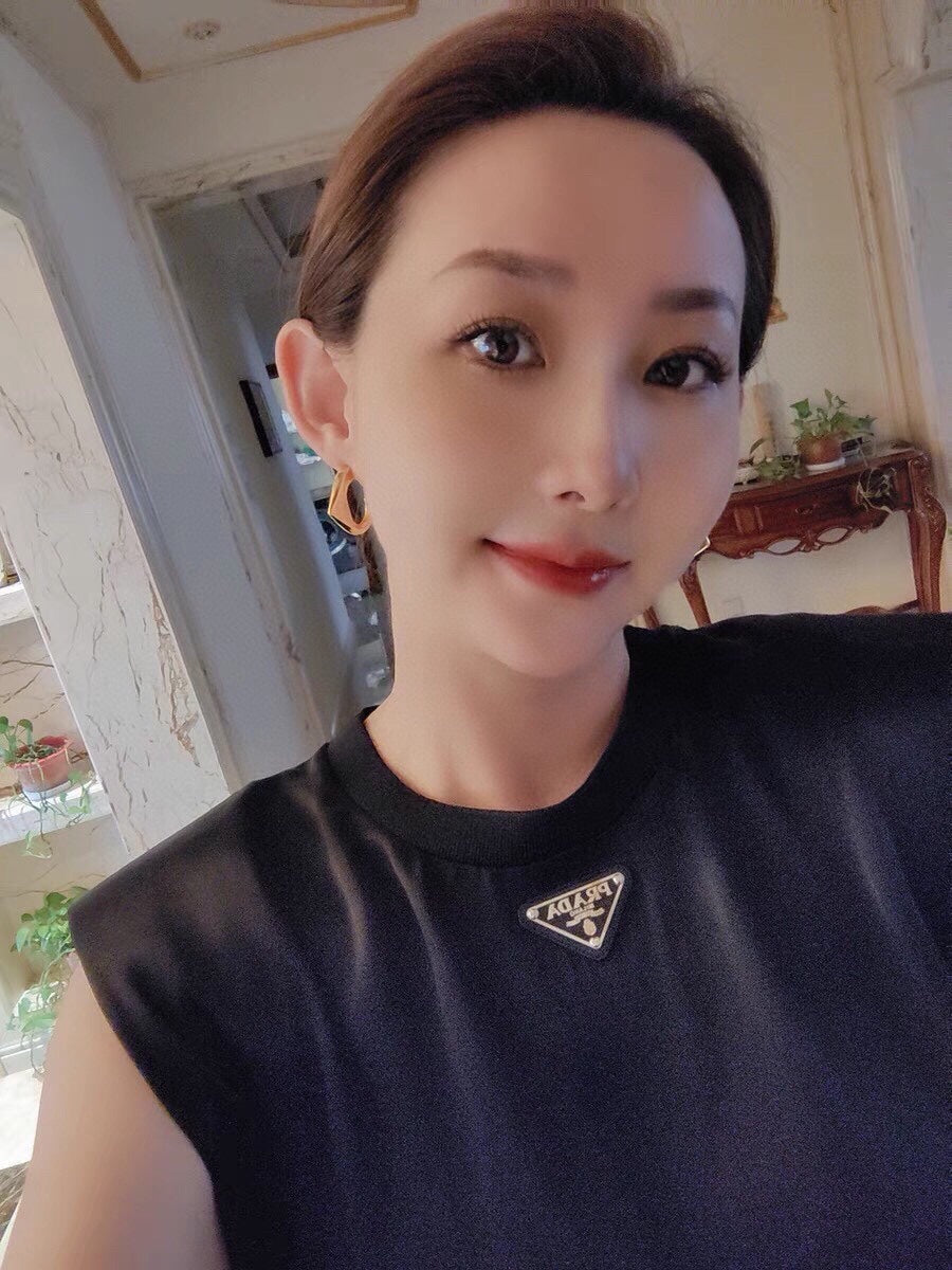 Prada Triangle Open 18K Gold Earrings product image 8, provided for visual reference and product detail review