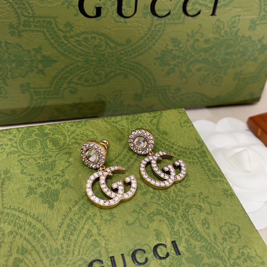 Gucci Double Crystal Pendant 18K Gold Earrings product image 3, provided for visual reference and product detail review