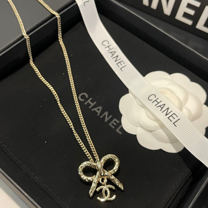Chanel Gold Bow Tie 18K Gold Necklace product image 6, provided for visual reference and product detail review
