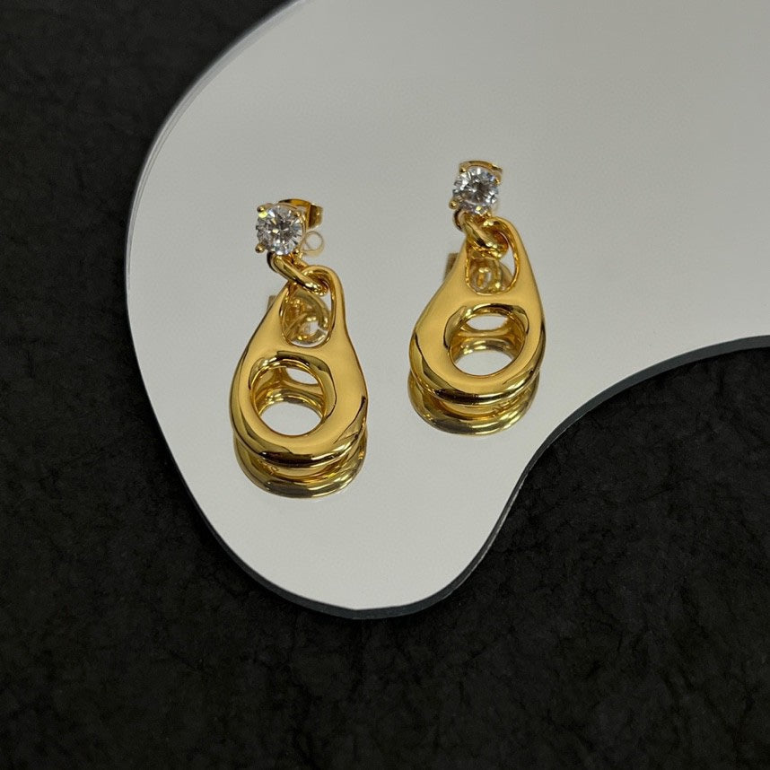 Prada Inverted Triangle 18K Gold Earrings product image 3, provided for visual reference and product detail review