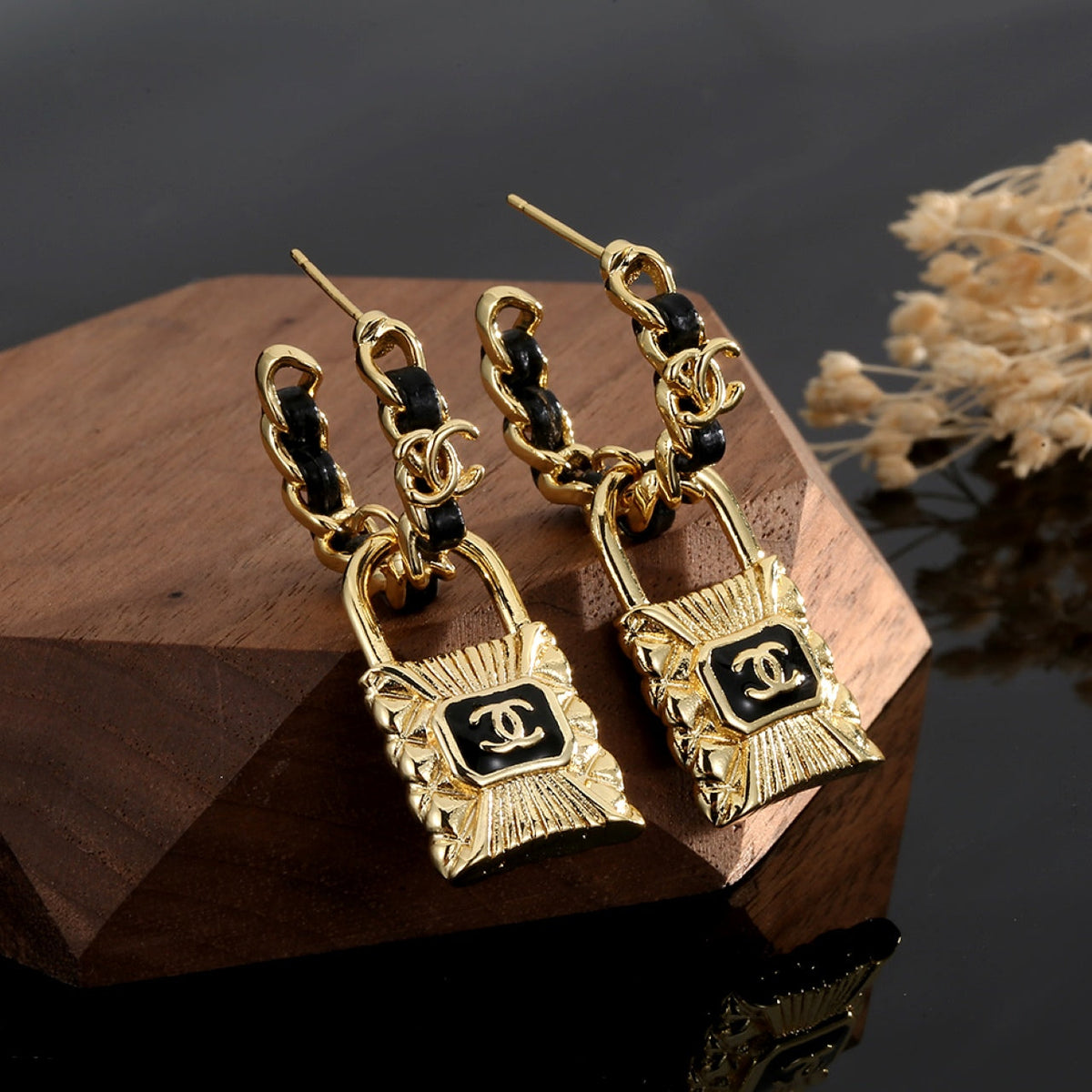 Chanel Lock 18K Gold Earrings product image 2, provided for visual reference and product detail review