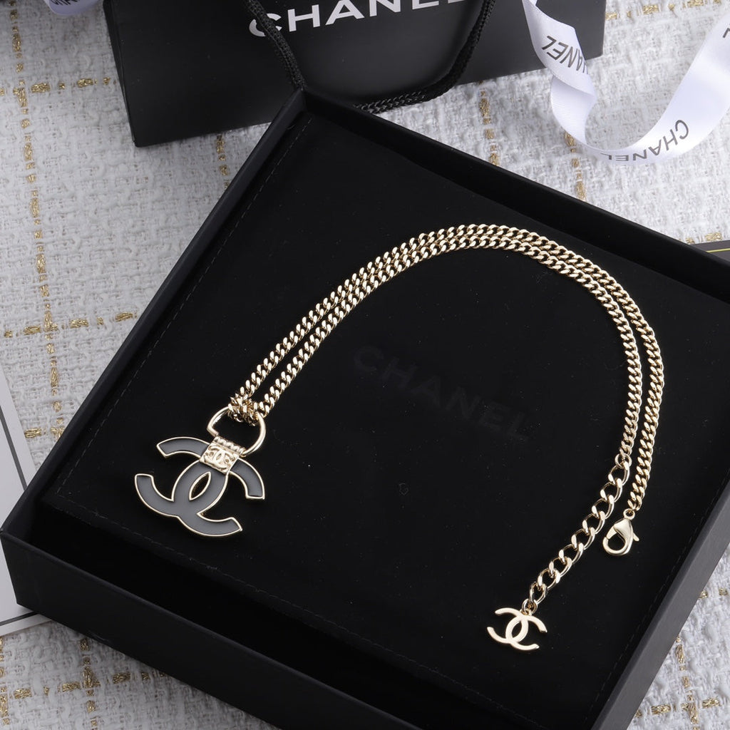 Chanel Black Resin Logo 18K Gold Necklace product image 6, provided for visual reference and product detail review