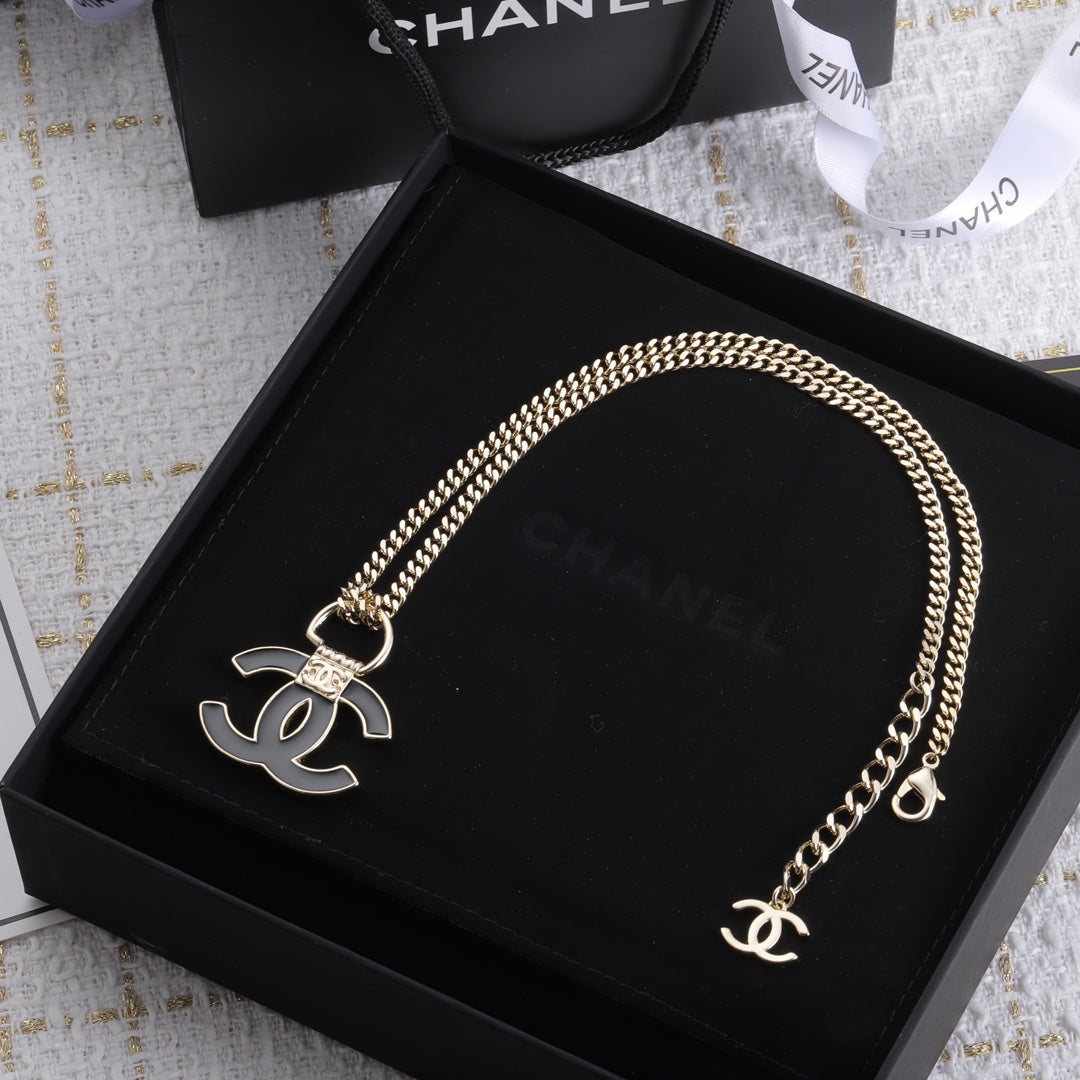 Chanel Black Resin Logo 18K Gold Necklace product image 6, provided for visual reference and product detail review
