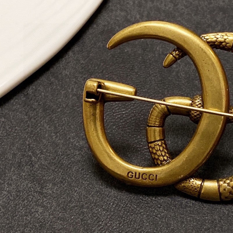 Gucci Double Snake 18K Gold Brooch product image 8, provided for visual reference and product detail review