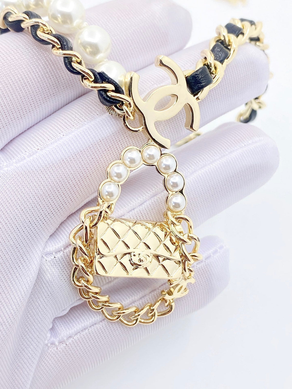 Chanel Pearl Bag Pendant 18K Gold Necklace product image 4, provided for visual reference and product detail review