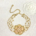 Chanel Camellia Choker 18K Gold Necklace product image 1, provided for visual reference and product detail review
