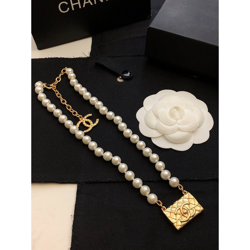 Chanel Pearl Bag Pendant 18K Gold Necklace product image 6, provided for visual reference and product detail review
