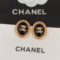 Chanel Oval Leather 18K Gold Earrings product image 1, provided for visual reference and product detail review