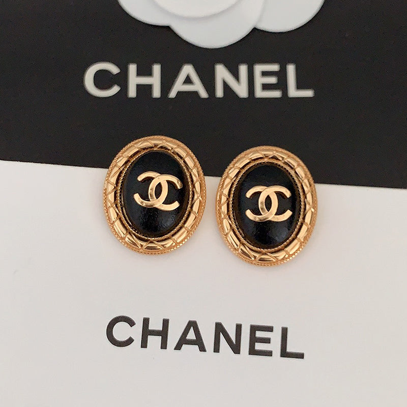 Chanel Oval Leather 18K Gold Earrings product image 1, provided for visual reference and product detail review