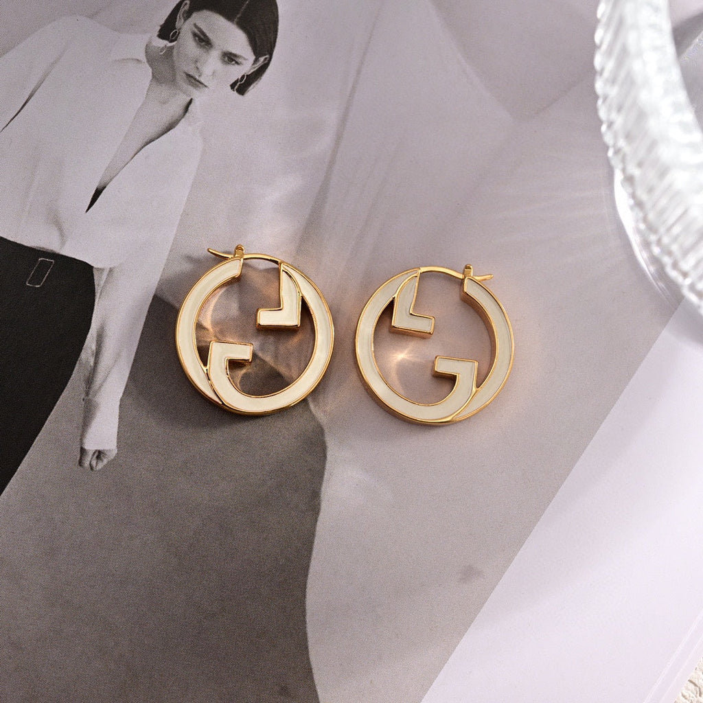 Gucci Double Pink Hollow 18K Gold Earrings product image 2, provided for visual reference and product detail review