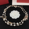 Chanel No.5 Star Long Pearl 18K Gold Necklace product image 1, provided for visual reference and product detail review