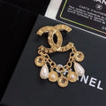 Chanel Pearl Pendant 18K Gold Brooch product image 1, provided for visual reference and product detail review