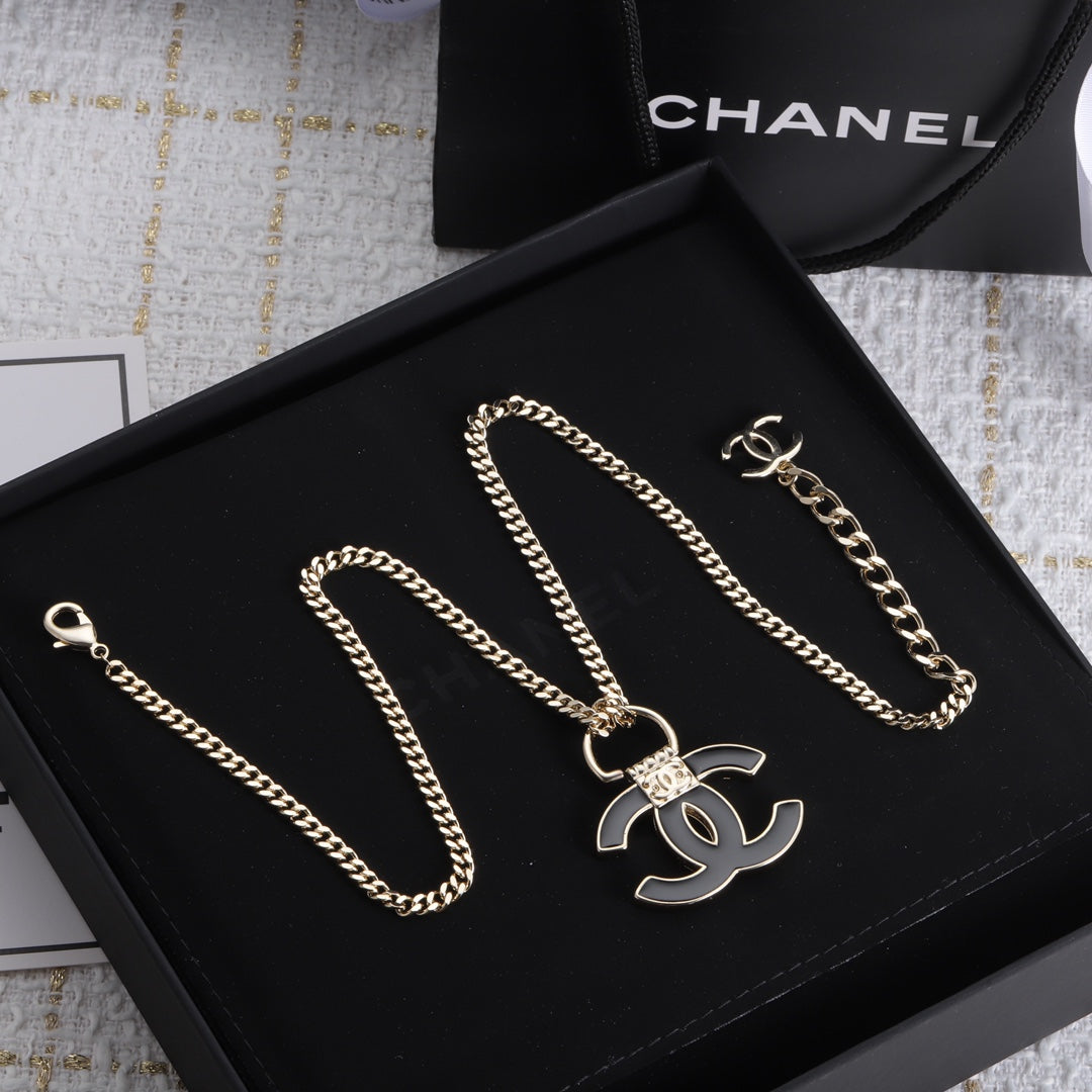 Chanel Black Resin Logo 18K Gold Necklace product image 2, provided for visual reference and product detail review